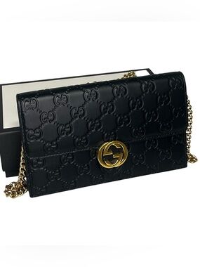 Gucci Embossed GG Leather Wallet on a Chain